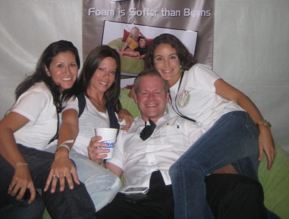 A group of friends relaxing on a giant Fombag at the Kick Gas Festival